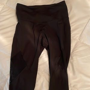 Old navy black leggings with mesh design on the legs